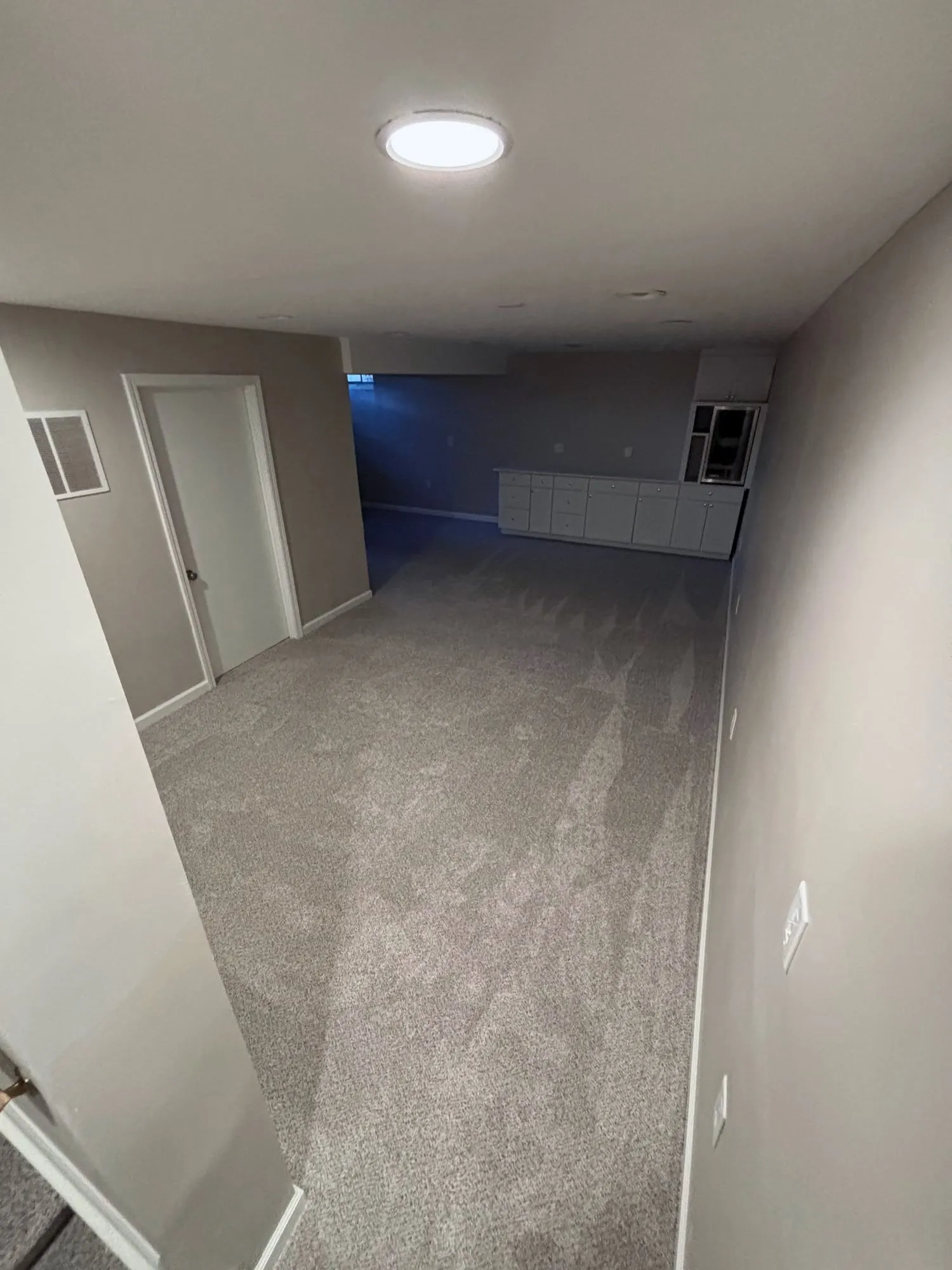 Finished basement with new carpet