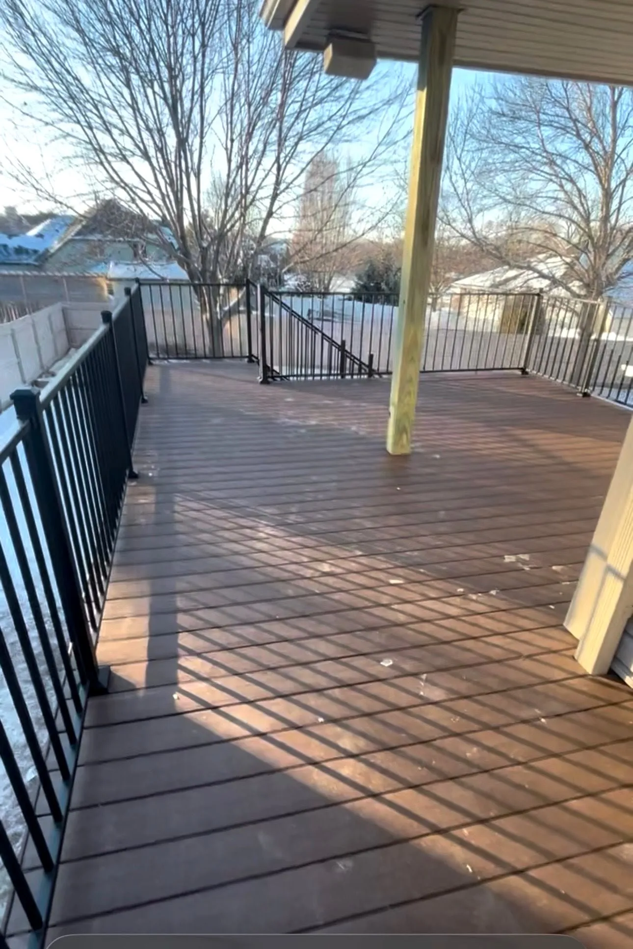Composite deck with a black railing