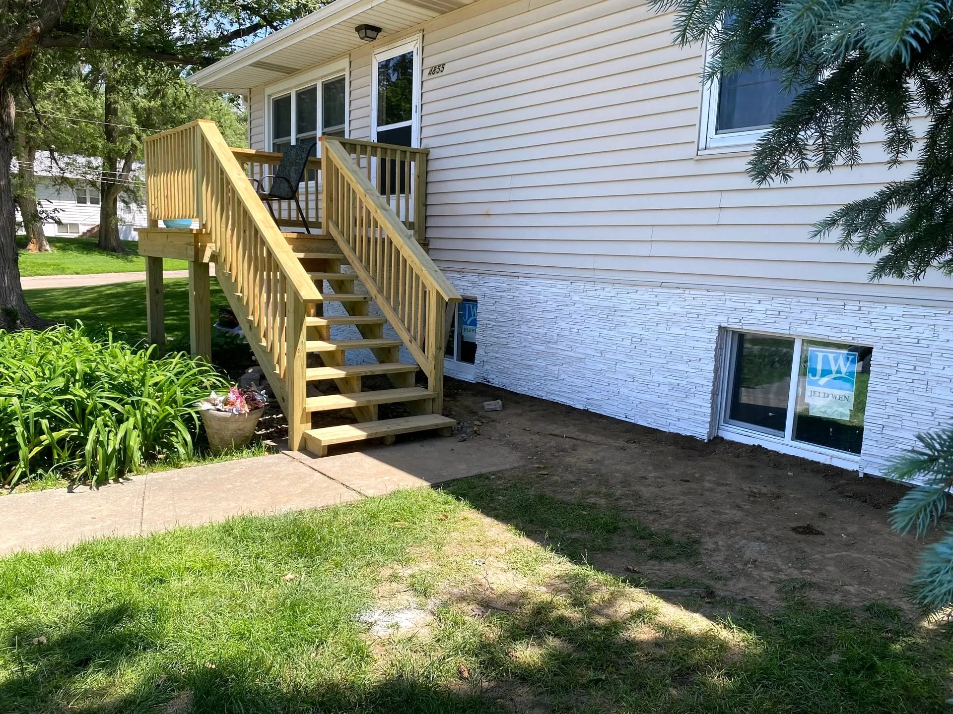 New pressure-treated deck stairs