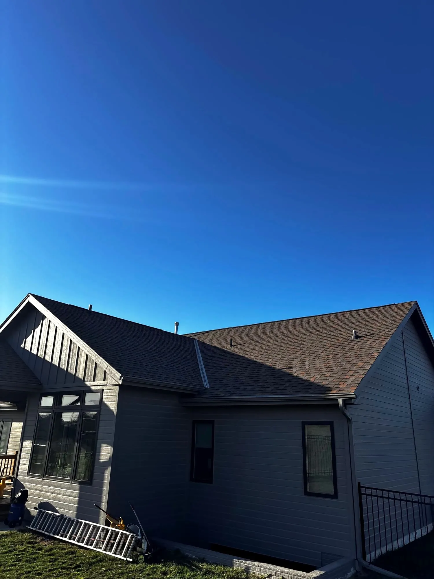 New roof and board-and-batten siding on a house