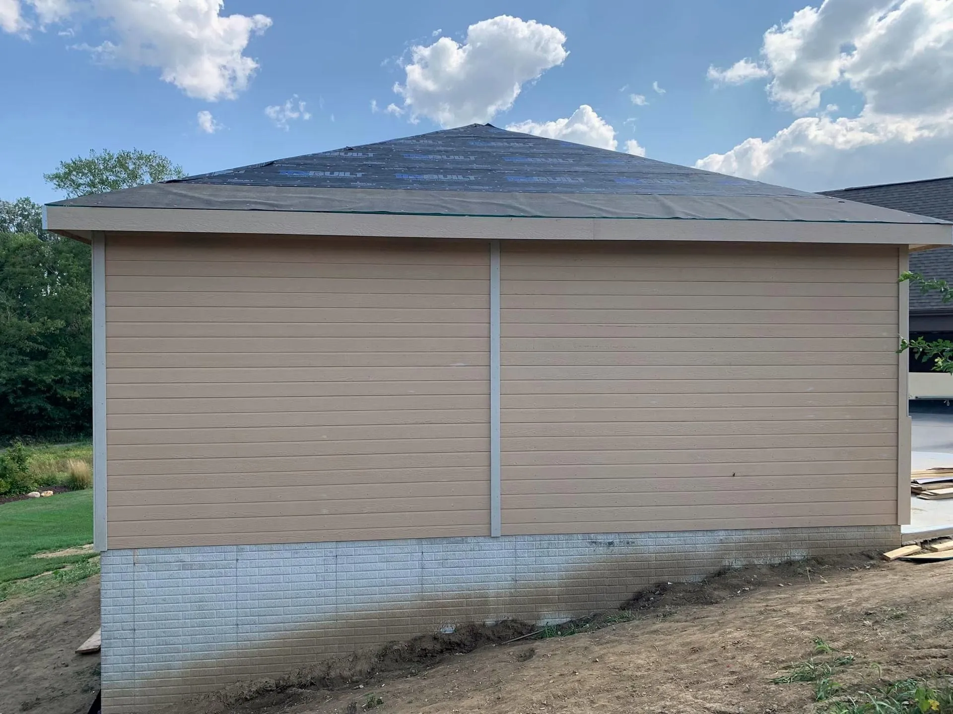 Detached garage with new siding and roof